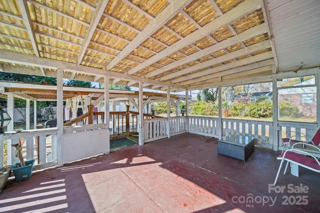 a view of a porch with furniture