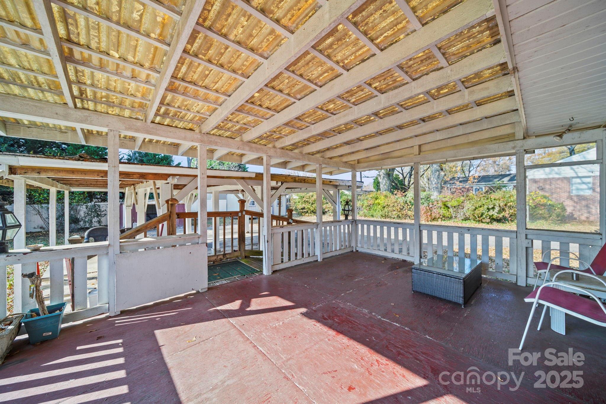1703 East Perry Street Gastonia, NC 28054 - Photo 29 of 30 a view of a porch with furniture
