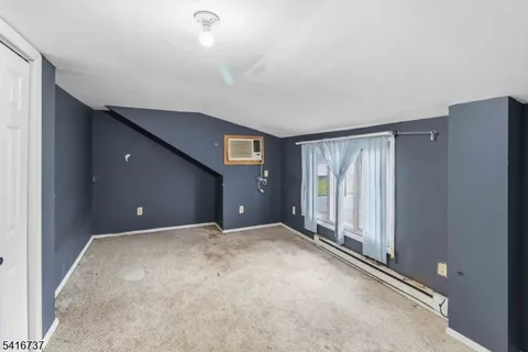 a view of a livingroom with a staircase