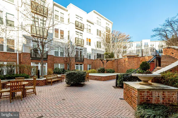 a city street lined with tall buildings