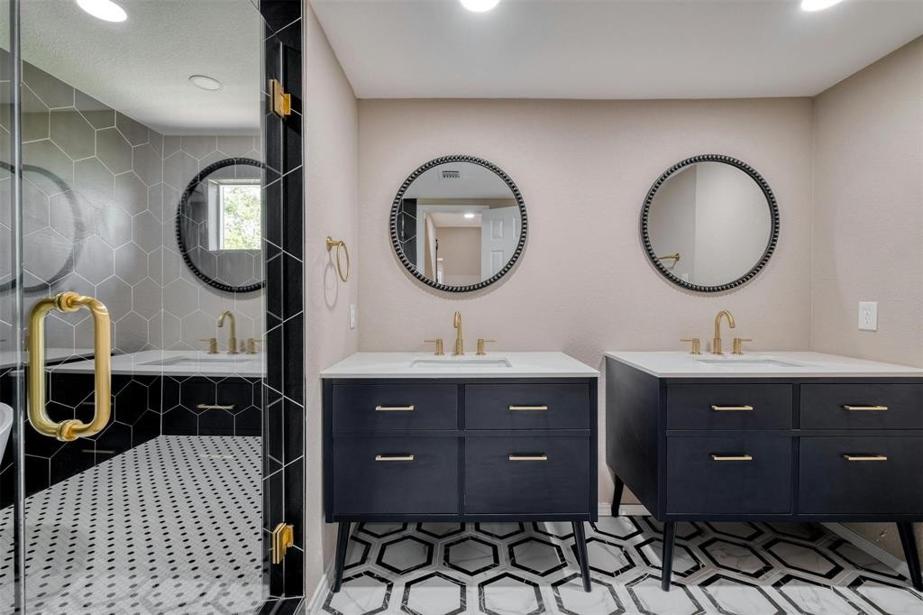2550 FM 972 Georgetown, TX 78626 - Photo 12 of 29 a bathroom with a double vanity sink and a mirror