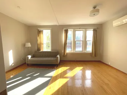 a living room with a couch and a table