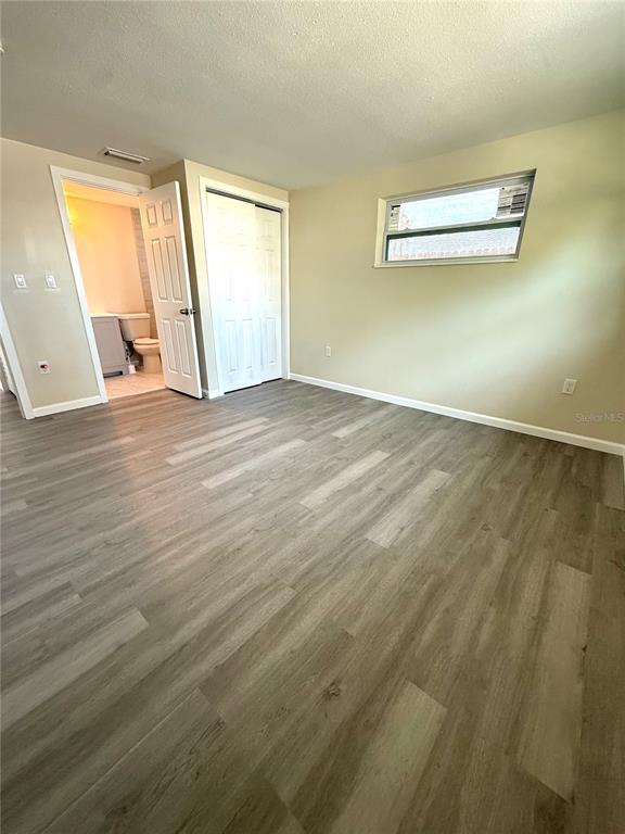 5318 Cedar Lane New Port Richey, FL 34652 - Photo 21 of 32 wooden floor in an empty room