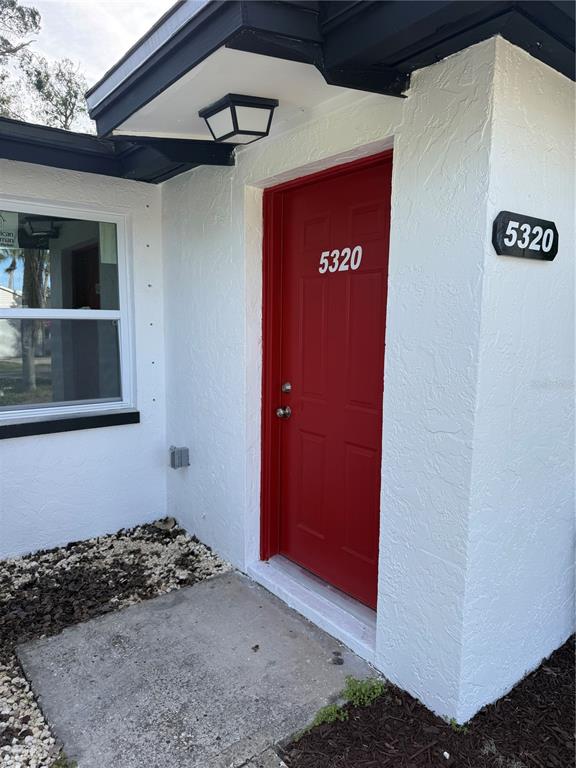 5318 Cedar Lane New Port Richey, FL 34652 - Photo 25 of 32 a view of a door of the house