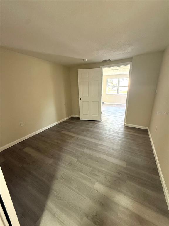 5318 Cedar Lane New Port Richey, FL 34652 - Photo 28 of 32 a view of an empty room and window