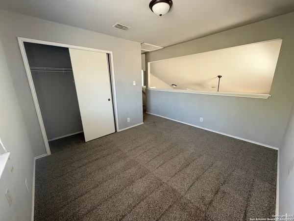 an empty room with window