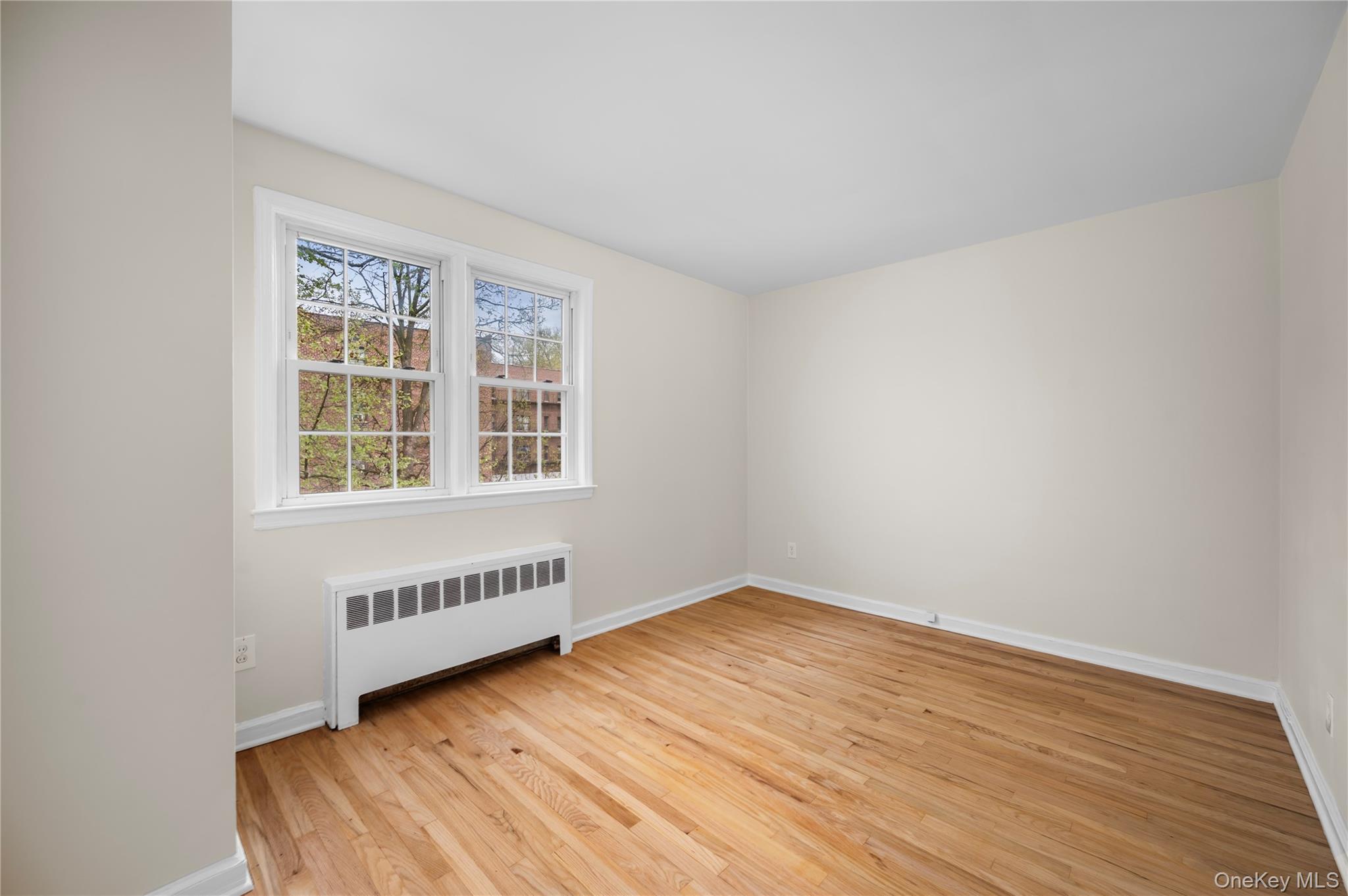 51 Cross Street, Unit 3B Yonkers, NY 10708 - Photo 12 of 18 Bedroom with hardwood flooring throughout