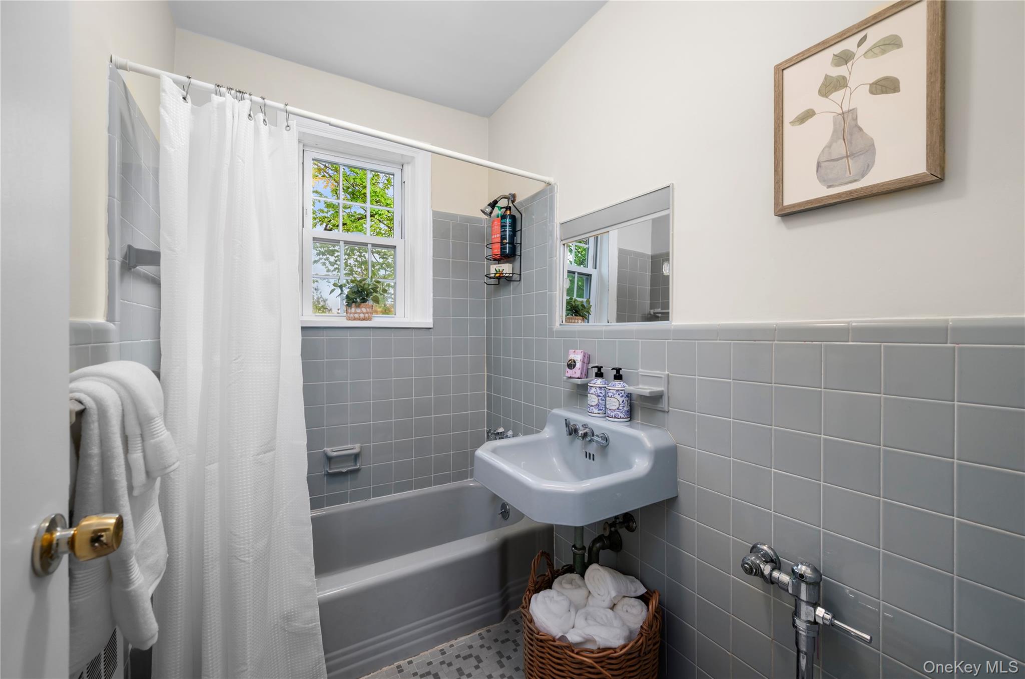 51 Cross Street, Unit 3B Yonkers, NY 10708 - Photo 9 of 18 Bathroom featuring light gray tiled, bathtub, and a wall-mounted sink