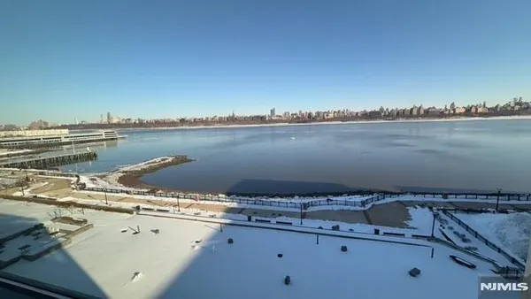 a view of a terrace with a lake view