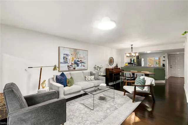 a bedroom with a bed and a table