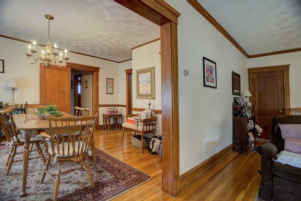 44 Cottage Park Road Winthrop, MA 02152 - Photo 27 of 39 a view of a livingroom with furniture and a chandelier