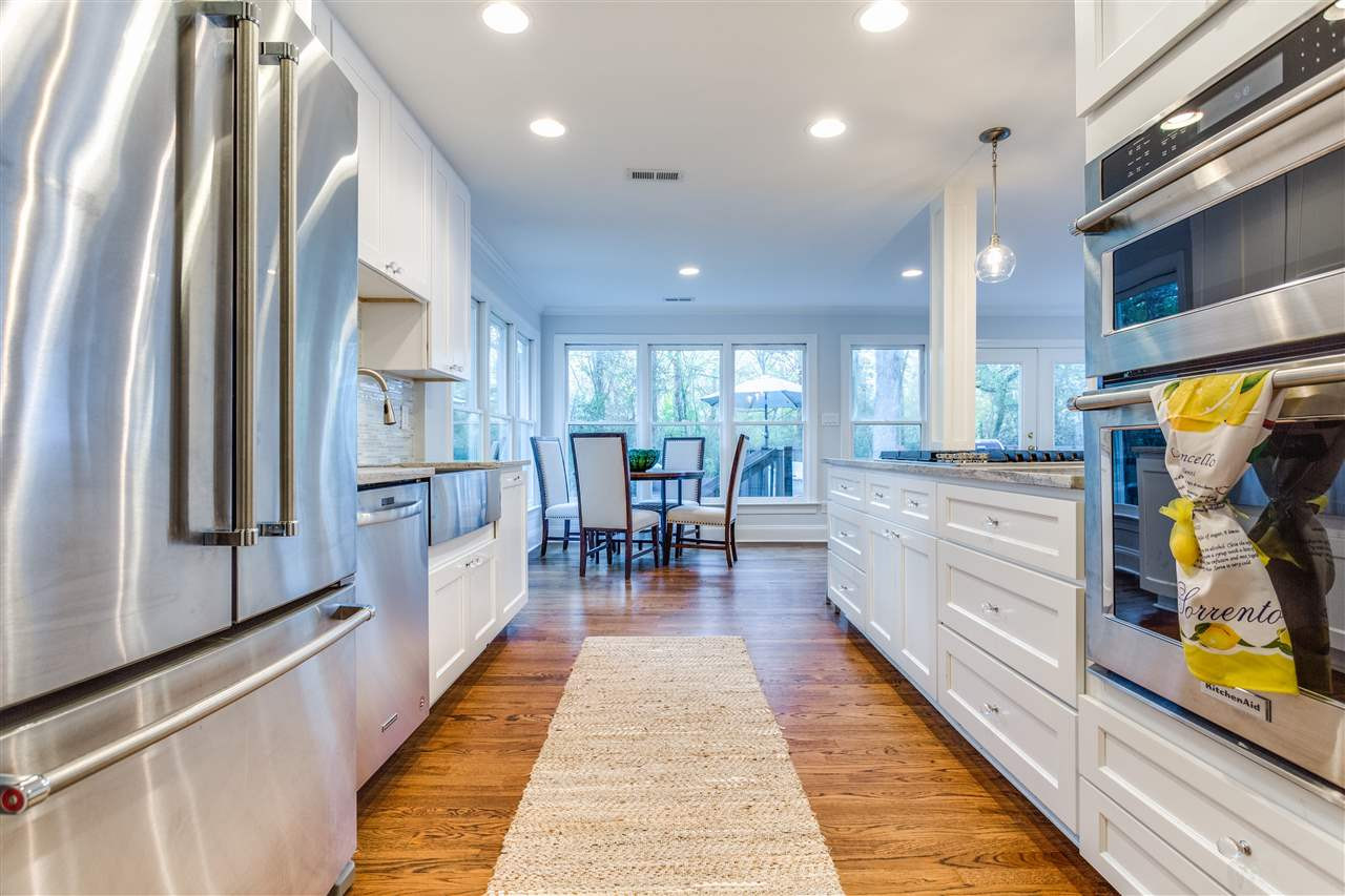 2715 Rothgeb Drive Raleigh, NC 27609 - Photo 14 of 25 HUGE AREA FOR BREAKFAST TABLE AND WHAT A GREAT VIEW OF THE BACK YARD! Kitchen