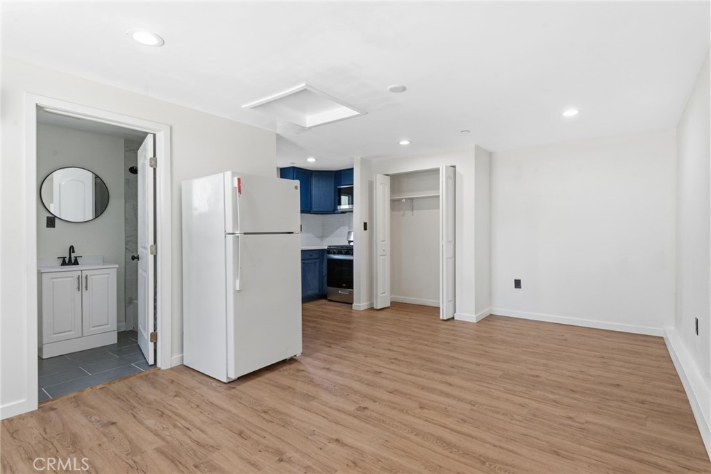 8040 Ranchito Avenue Panorama City, CA 91402 - Photo 42 of 64 a view of a kitchen with a refrigerator and a sink