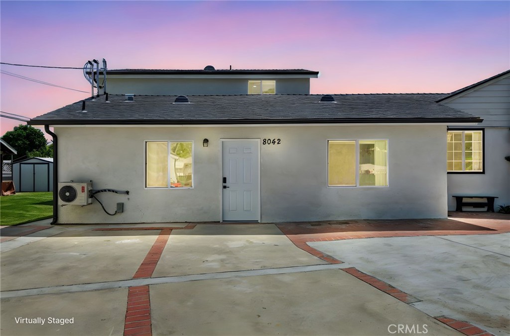 8040 Ranchito Avenue Panorama City, CA 91402 - Photo 47 of 64 a front view of a house with yard