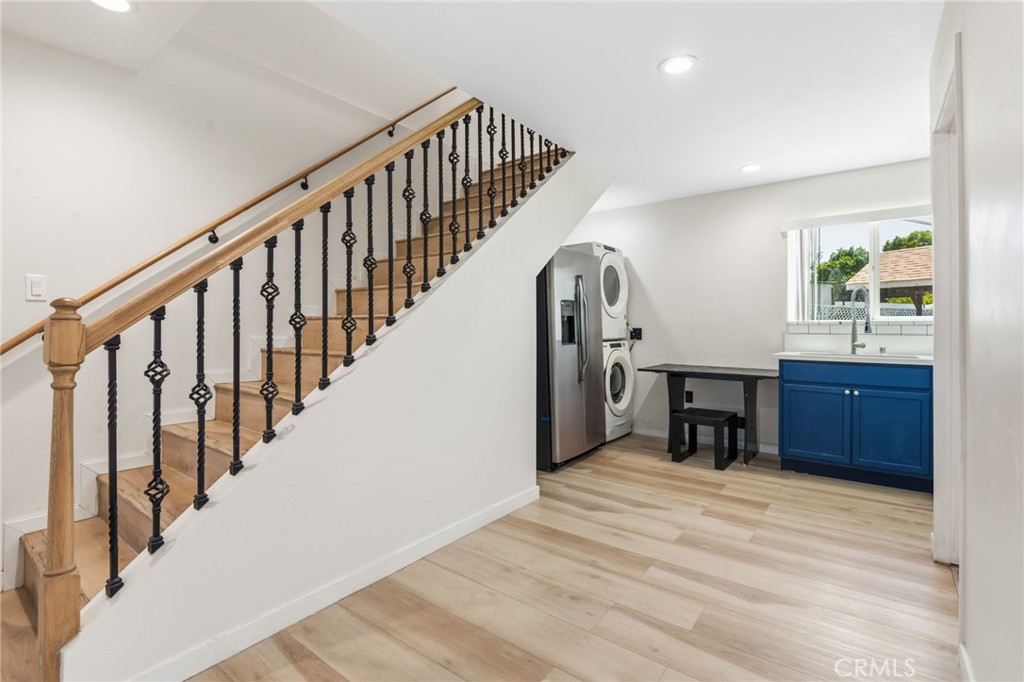 8040 Ranchito Avenue Panorama City, CA 91402 - Photo 49 of 64 a view of entryway and hall with wooden floor