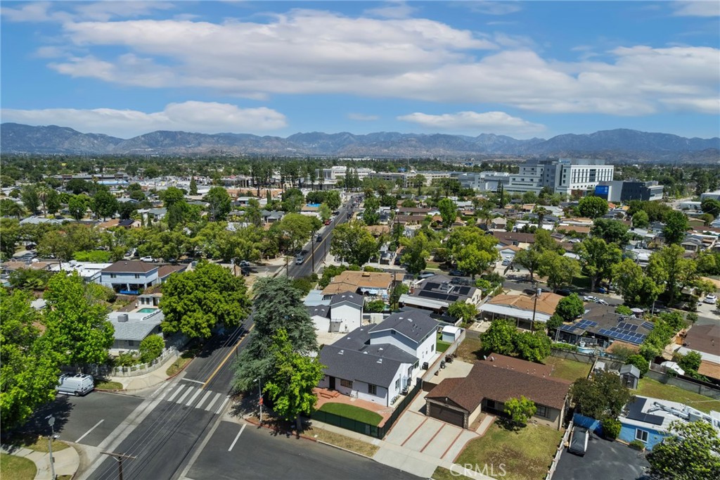 8040 Ranchito Avenue Panorama City, CA 91402 - Photo 62 of 64 an aerial view of residential houses with outdoor space
