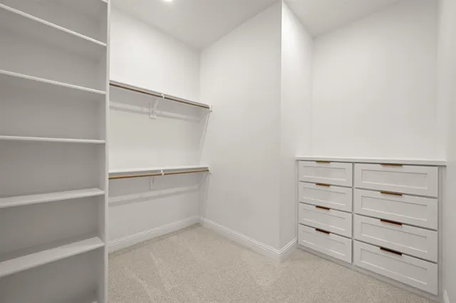 a view of an empty walk in closet