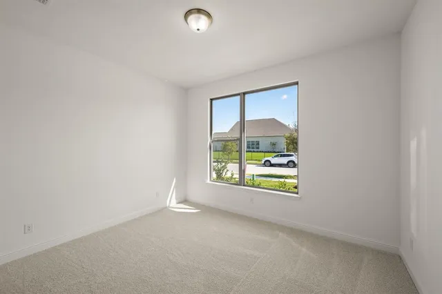 an empty room with window