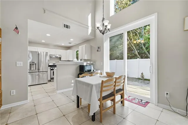 a workspace with kitchen island granite countertop furniture and a fireplace