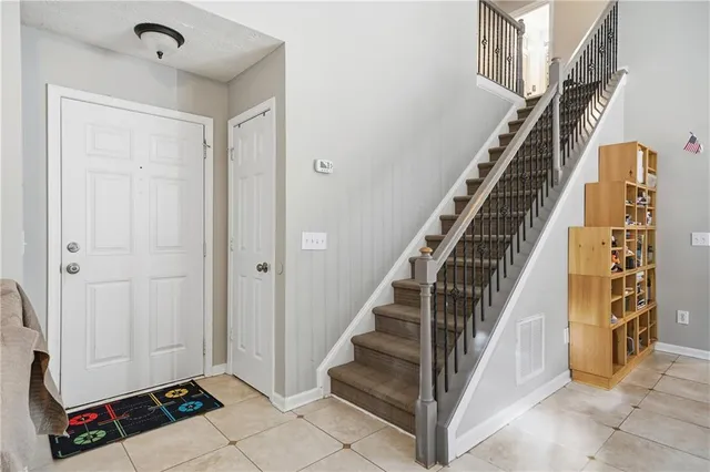 a view of an entryway with staircase