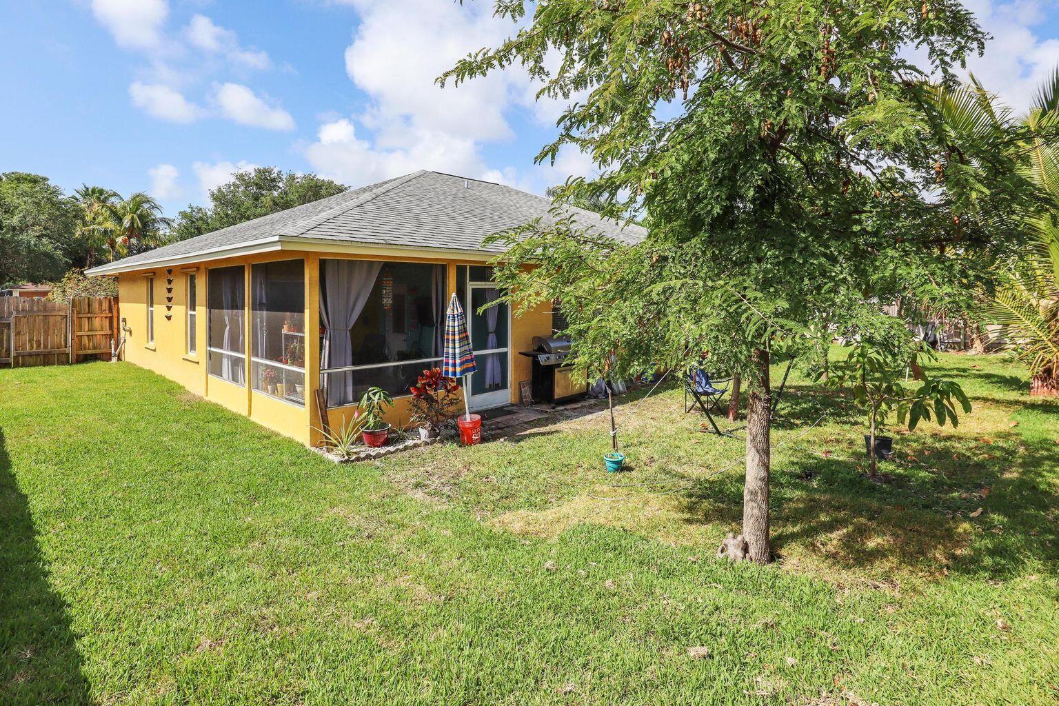 1101 Julia Heights Drive Lantana, FL 33462 - Photo 17 of 19 a view of a house with a backyard