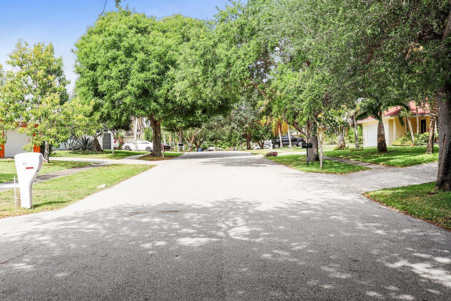 1101 Julia Heights Drive Lantana, FL 33462 - Photo 19 of 19 a view of road with trees