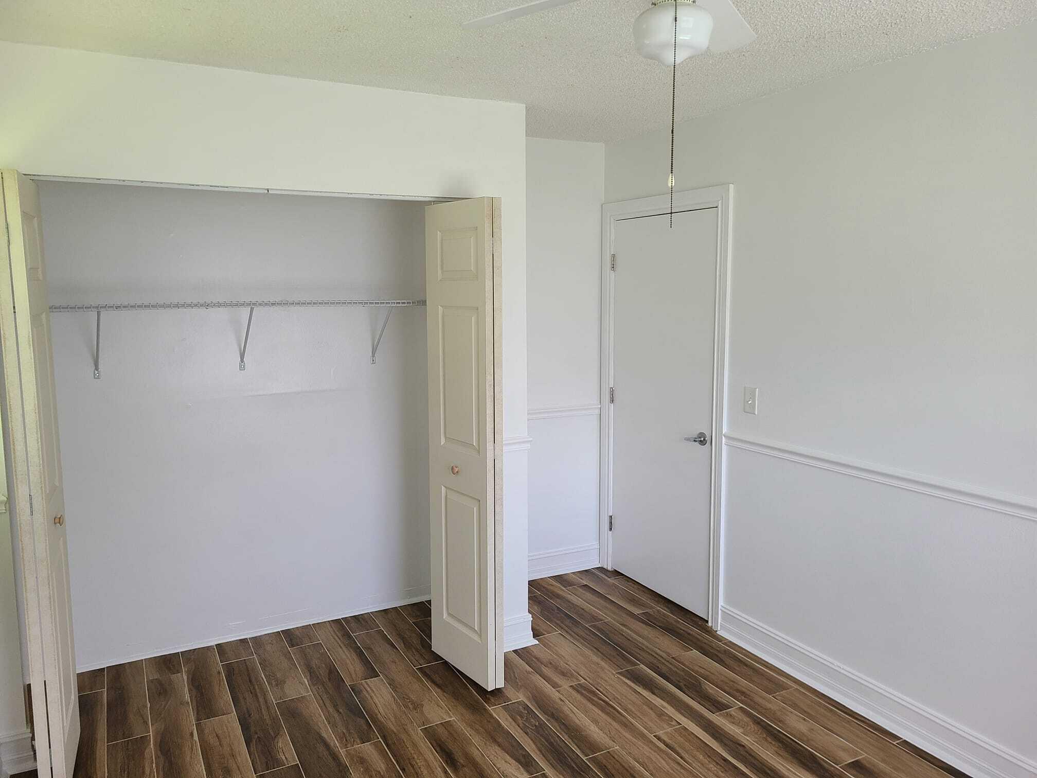 1101 Julia Heights Drive Lantana, FL 33462 - Photo 8 of 19 a view of room with wooden floor