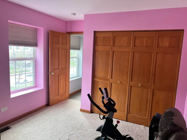 a view of a livingroom with furniture and a window
