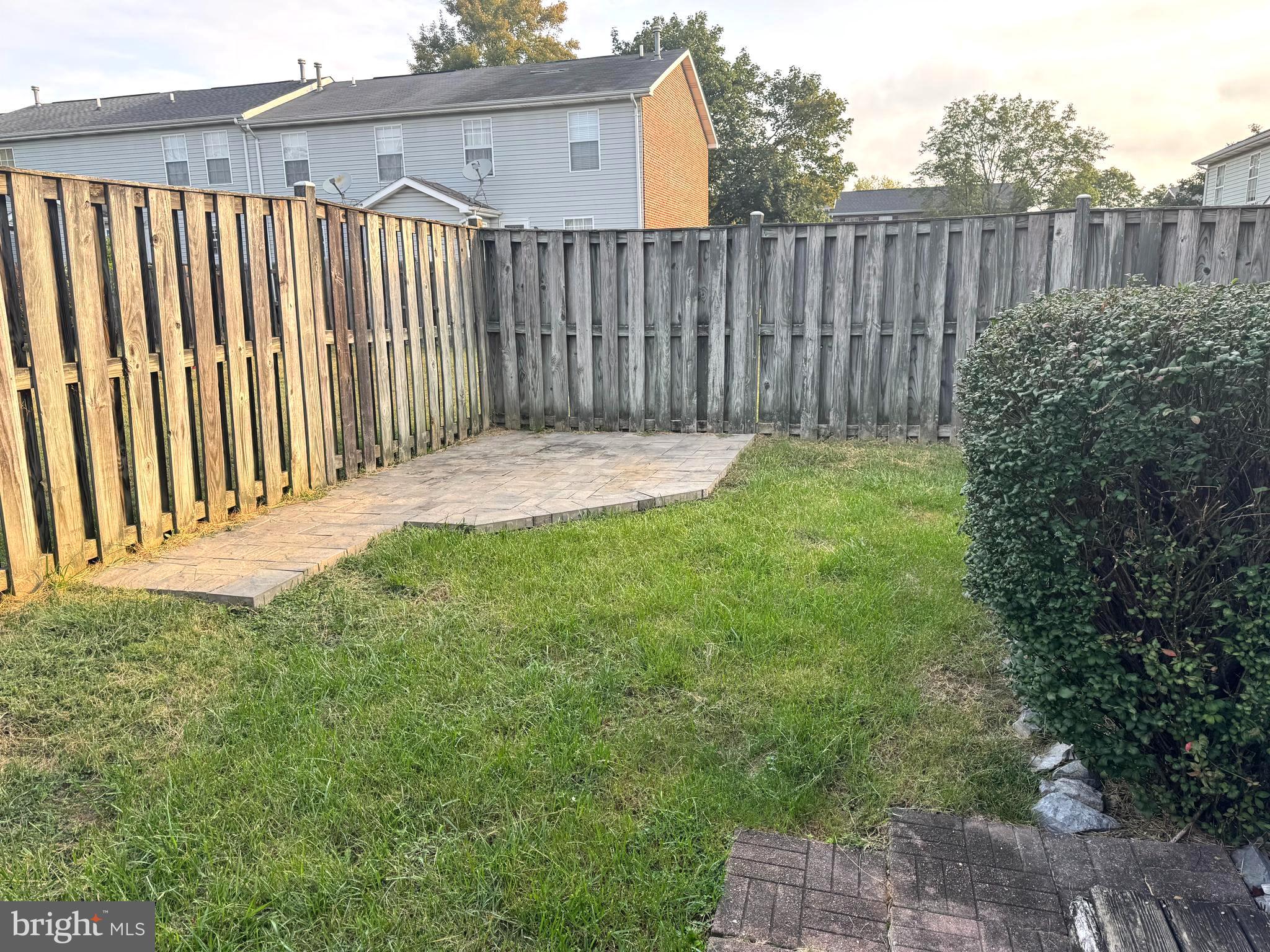 307 Willowbrook Court Winchester, VA 22602 - Photo 9 of 15 a view of a backyard with wooden fence