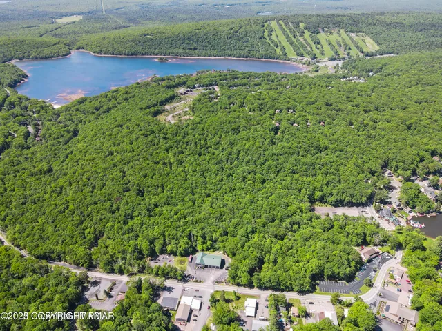 a view of a garden with a building