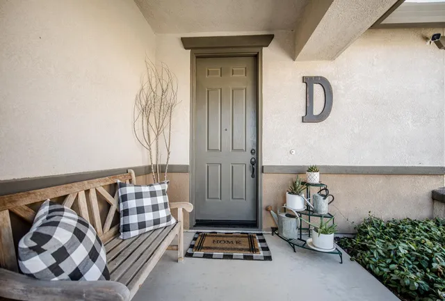 a view of a livingroom with furniture and windows
