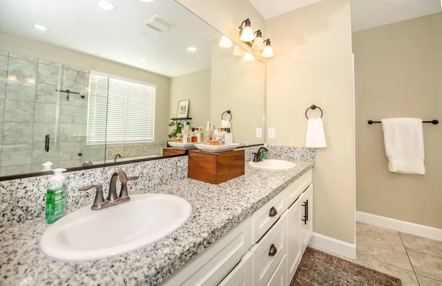 a bed room with a bed and a television