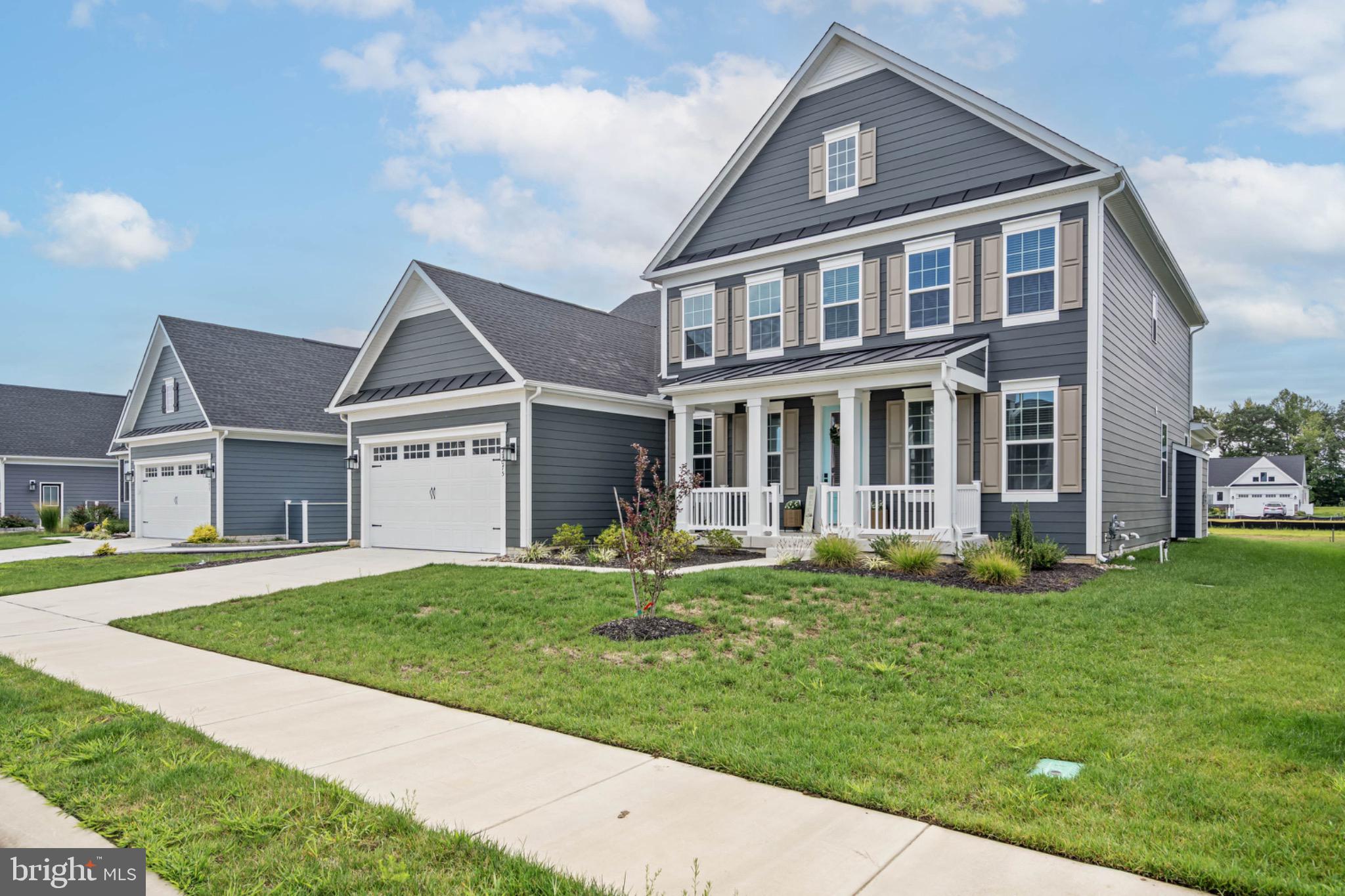 27075 Fieldfare Road Lewes, DE 19958 - Photo 2 of 56 Spacious Front Porch, Great for Rocking Chairs