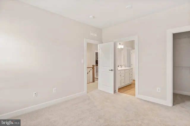 a view of a room with wooden walls