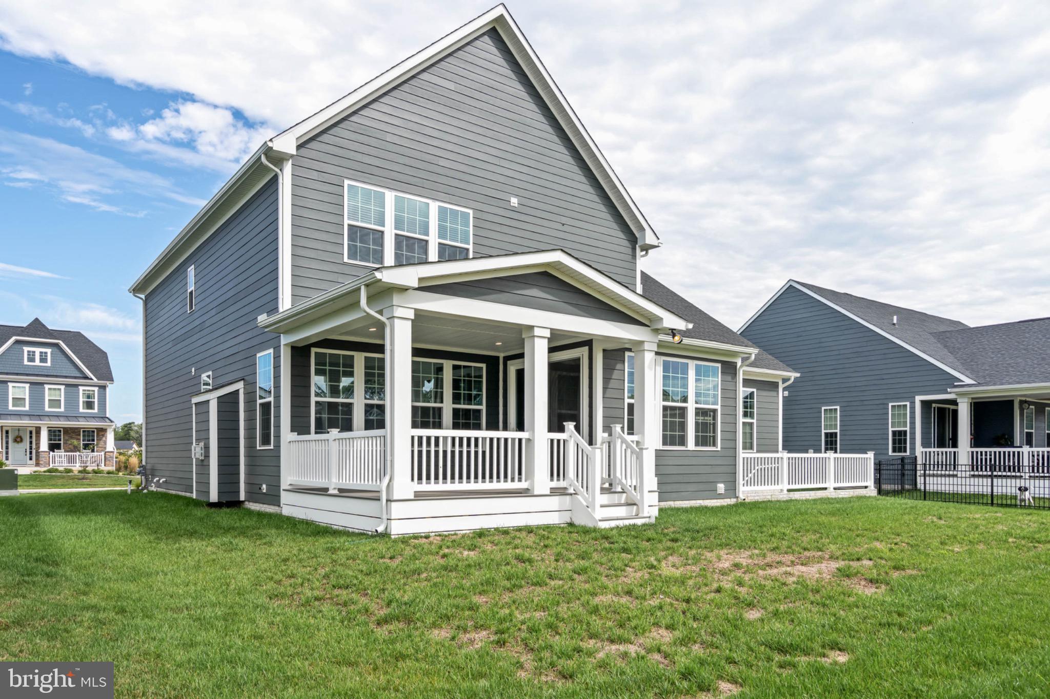 27075 Fieldfare Road Lewes, DE 19958 - Photo 44 of 56 Charming gray home with inviting porch.