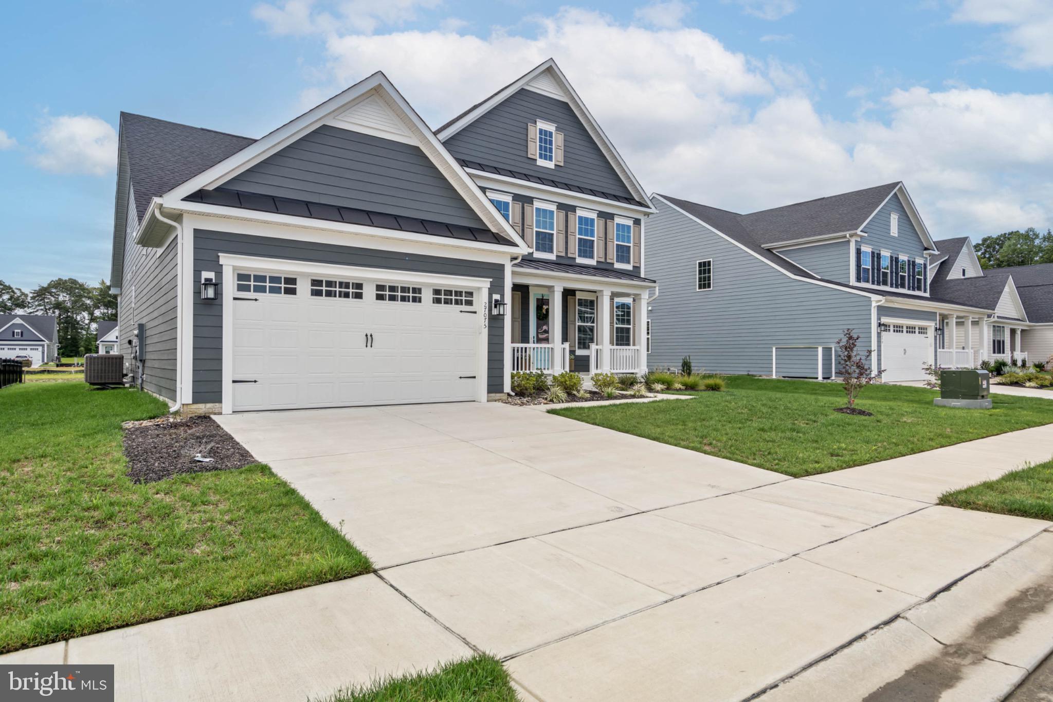 27075 Fieldfare Road Lewes, DE 19958 - Photo 5 of 56 Concrete Driveway w/Ample Parking
