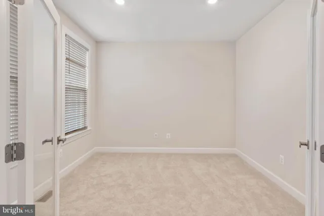 a view of a room that has a window in it