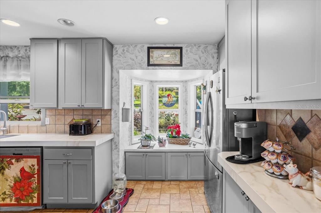 8386 Austin Road Melrose, FL 32666 - Photo 23 of 76 a kitchen with a sink and cabinets