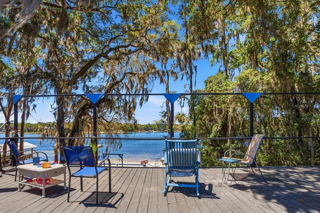 8386 Austin Road Melrose, FL 32666 - Photo 52 of 76 a view of chairs and tables in the patio