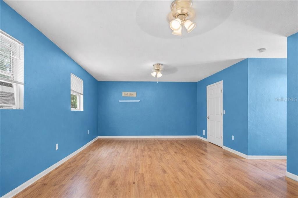 8386 Austin Road Melrose, FL 32666 - Photo 64 of 76 a view of empty room with wooden floor