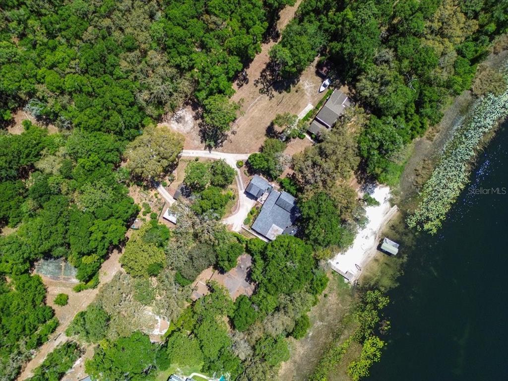 8386 Austin Road Melrose, FL 32666 - Photo 72 of 76 an aerial view of residential house with outdoor space and trees all around
