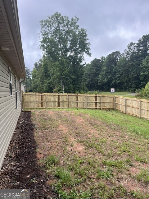 398 Riley Circle Northwest Milledgeville, GA 31061 - Photo 12 of 15 a view of outdoor space with deck and yard