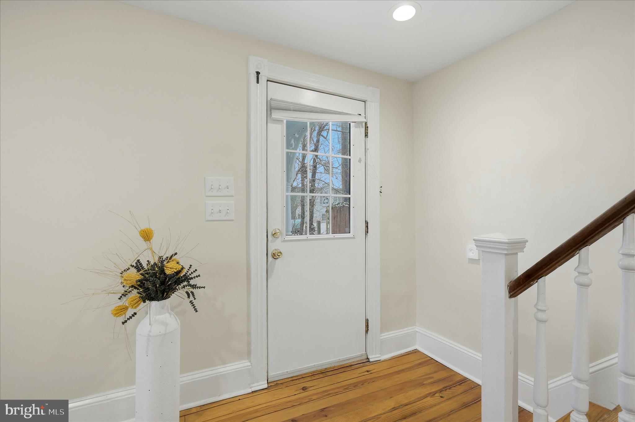 2 West Main Street Boyce, VA 22620 - Photo 12 of 65 a view of a room that has a window in wooden floor
