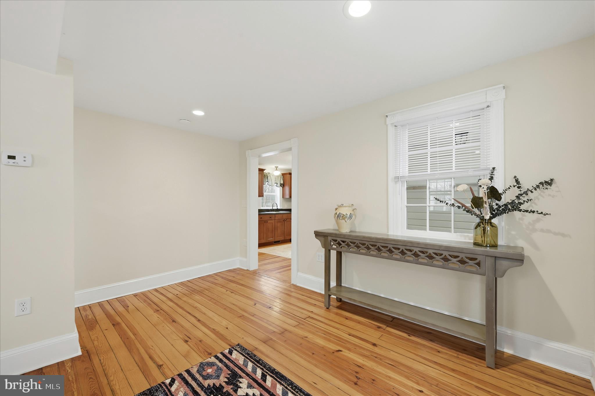 2 West Main Street Boyce, VA 22620 - Photo 17 of 65 a view of a room with wooden floor and bench