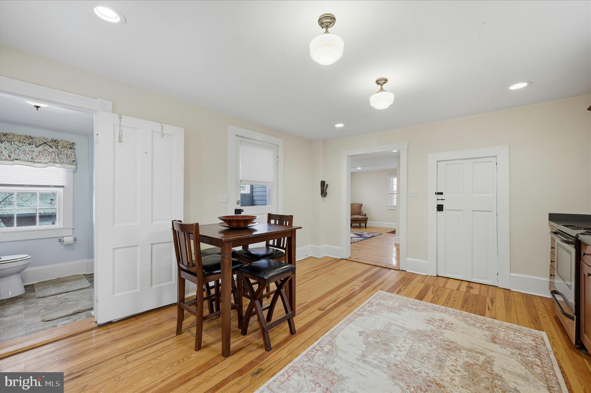 2 West Main Street Boyce, VA 22620 - Photo 25 of 65 a view of a dining room with furniture and wooden floor