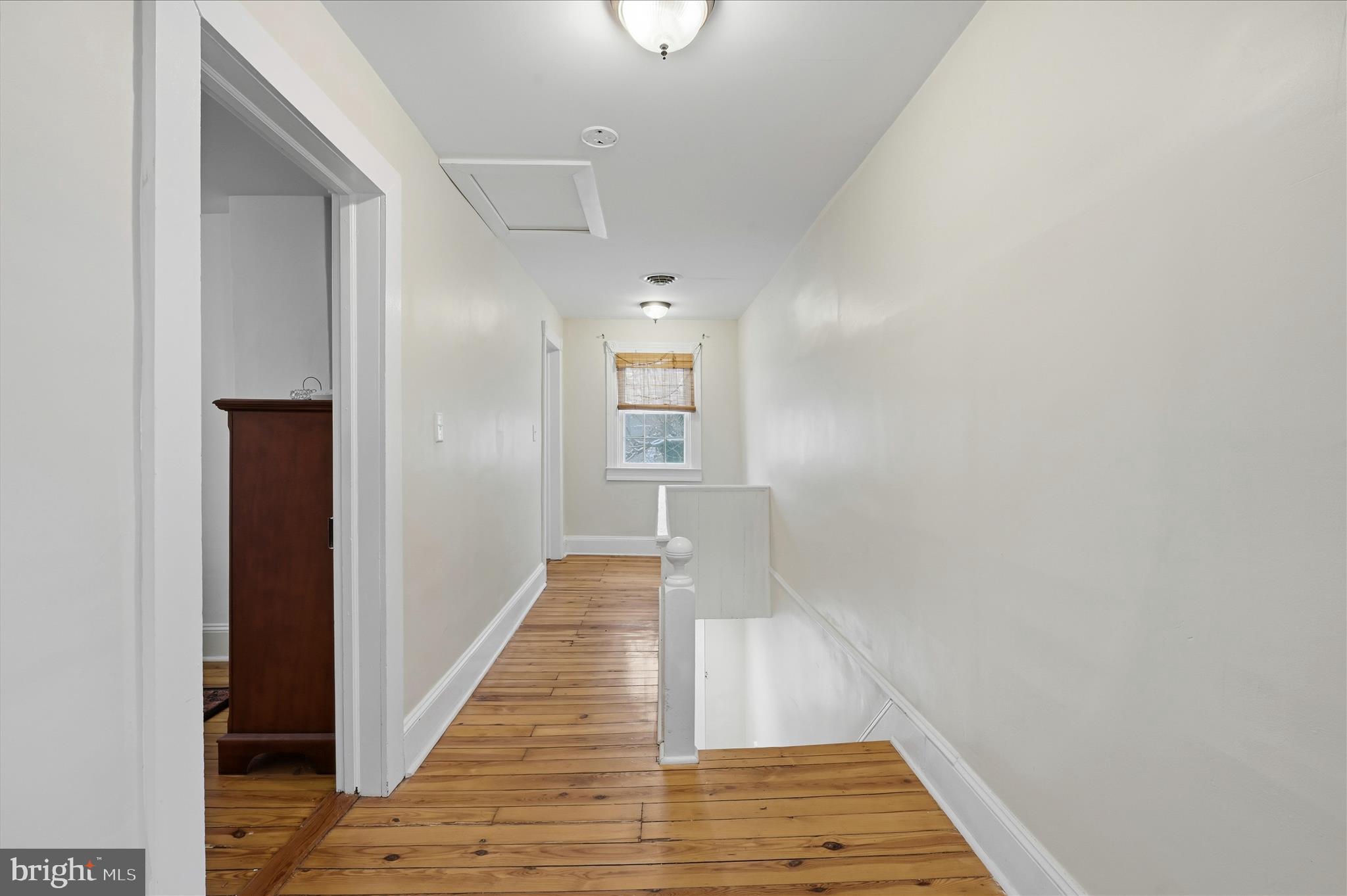 2 West Main Street Boyce, VA 22620 - Photo 38 of 65 a view of a hallway with wooden floor and staircase