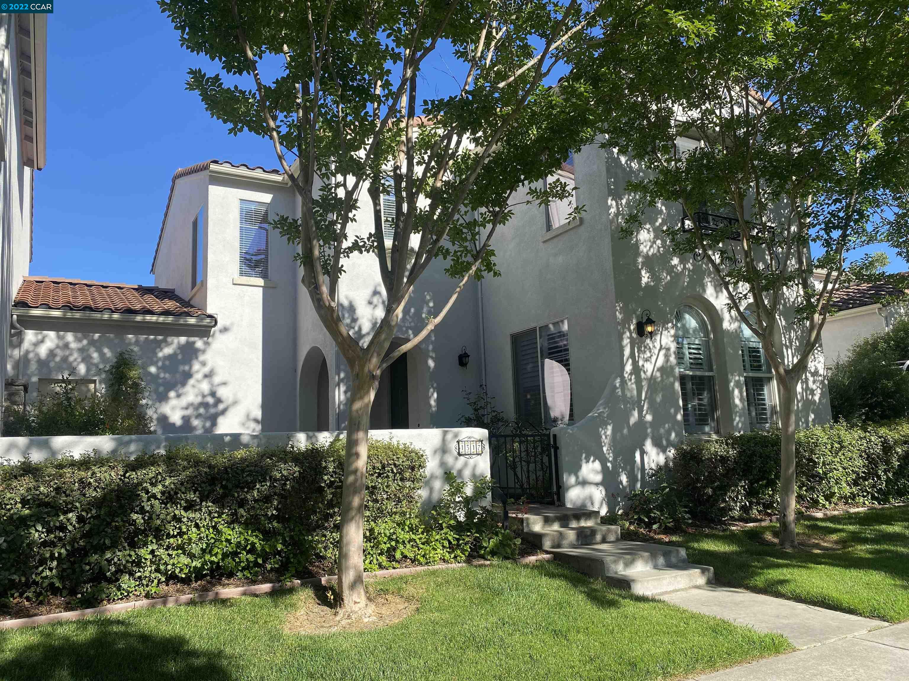 1317 Amaryllis Circle San Ramon, CA 94582 - Photo 1 of 24 a front view of a house with a yard