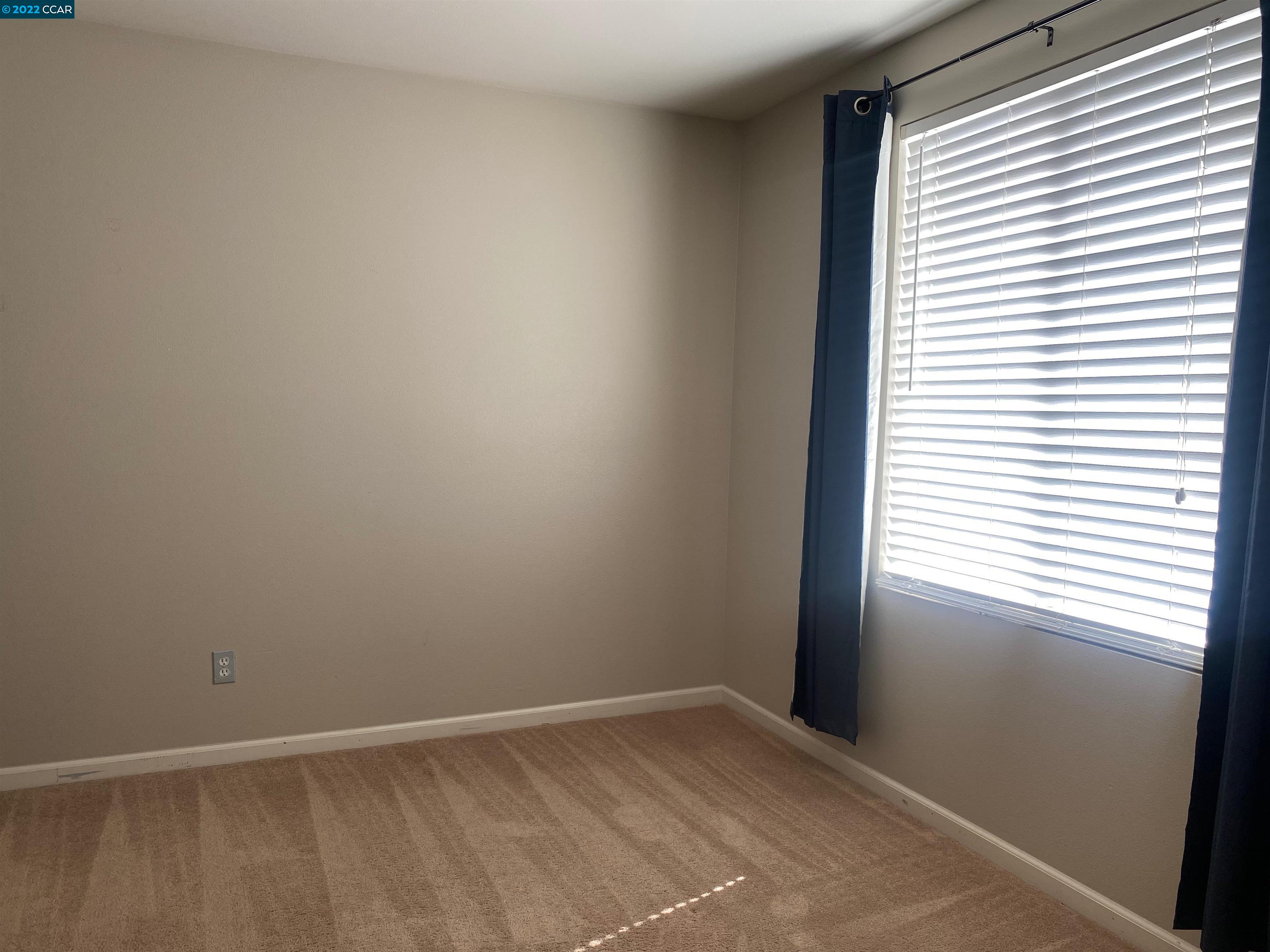 1317 Amaryllis Circle San Ramon, CA 94582 - Photo 16 of 24 a view of an empty room with a window