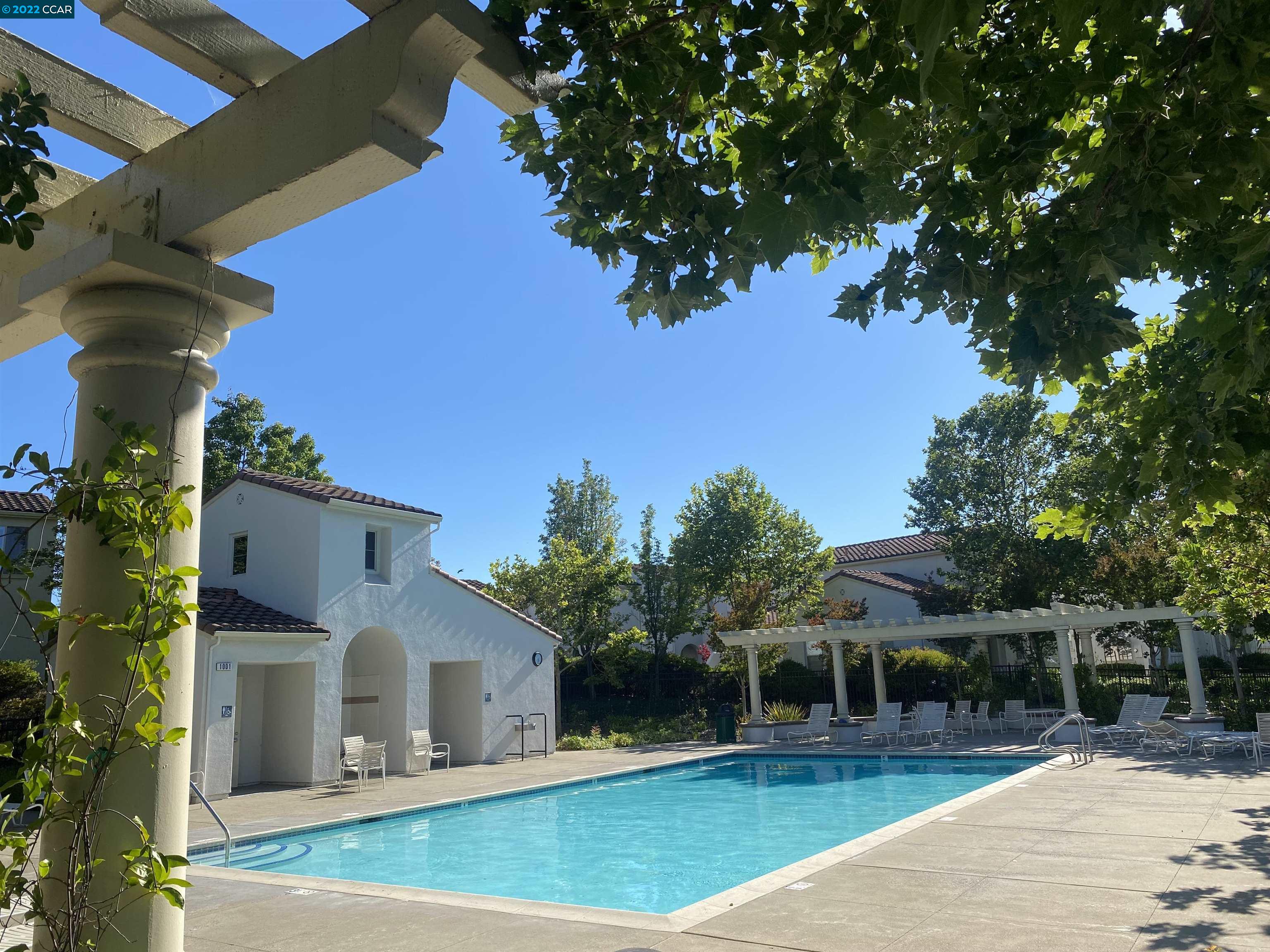 1317 Amaryllis Circle San Ramon, CA 94582 - Photo 21 of 24 a view of house with outdoor space and swimming pool