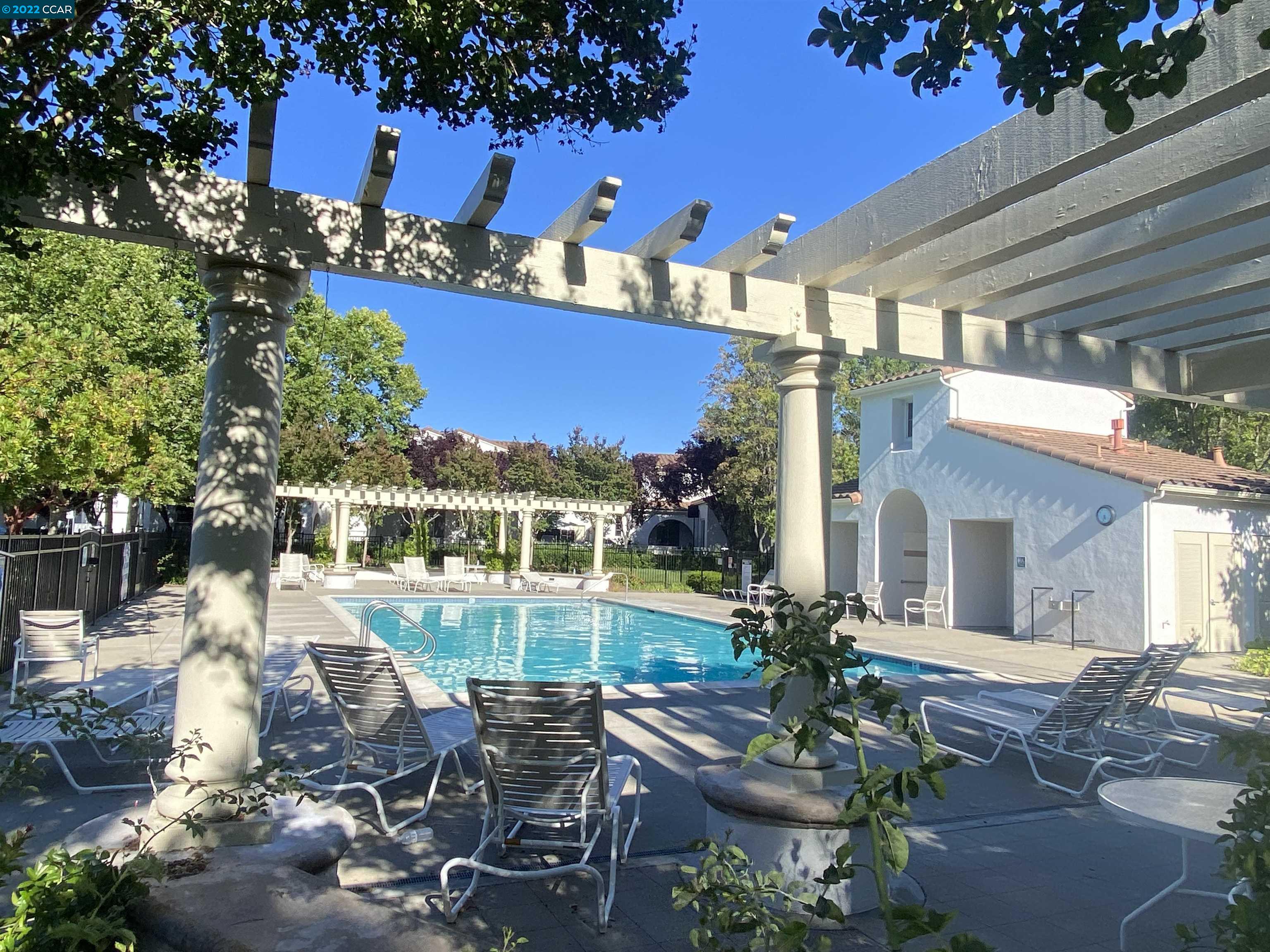 1317 Amaryllis Circle San Ramon, CA 94582 - Photo 23 of 24 a view of a patio with chairs and potted plants